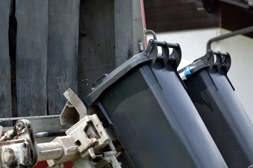 Workers segregating construction waste in Sudbury